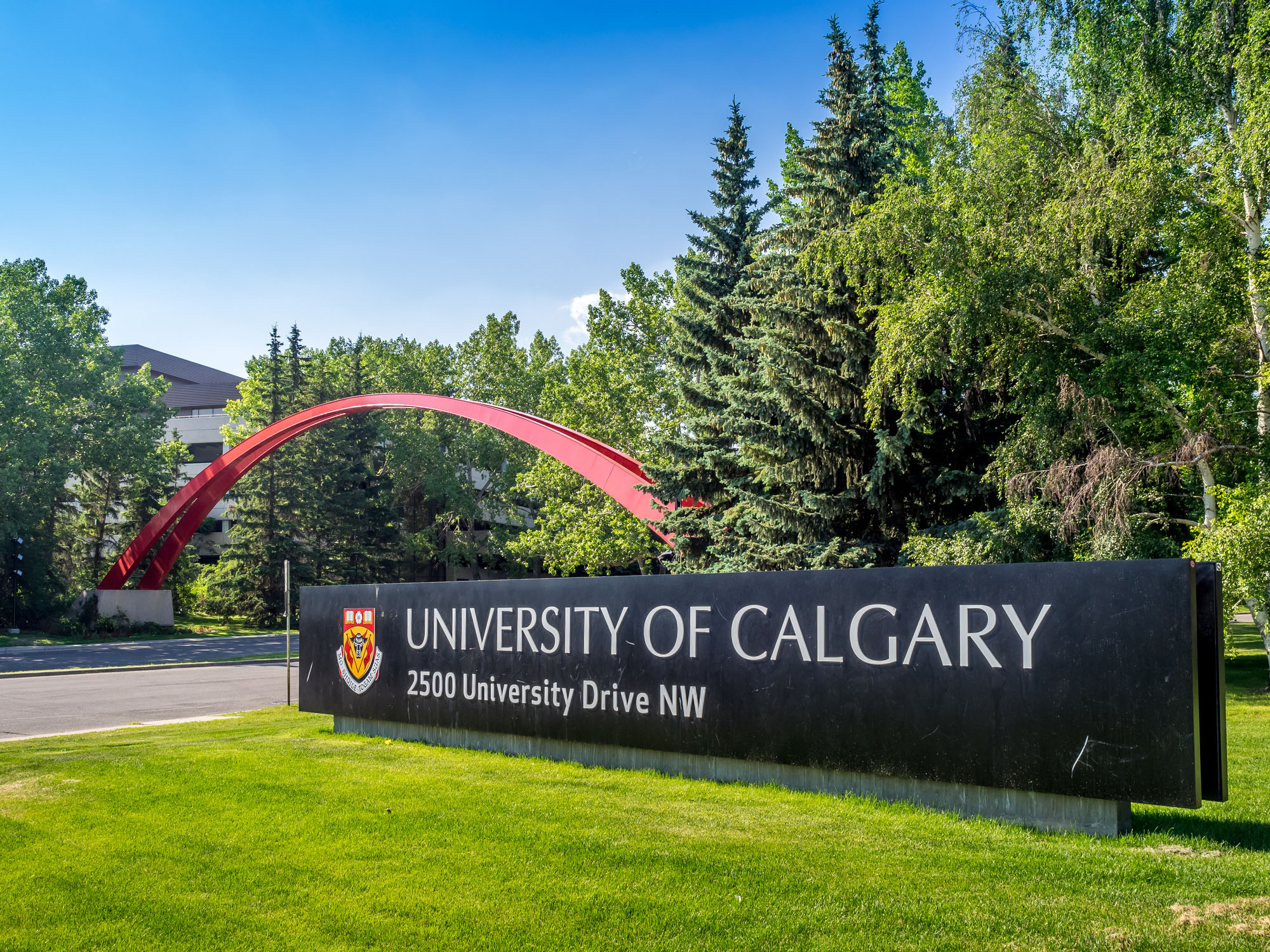 Calgary, Alberta, Canada - July 11, 2014: The University of Calgary entrance sign and arch on July 13, 2014 in Calgary, Alberta Canada. The sign and arch are the main feature marking the entrance to campus.